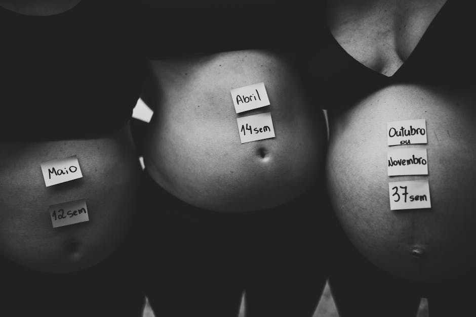 Three pregnant bellies labeled with months and weeks in grayscale setting.